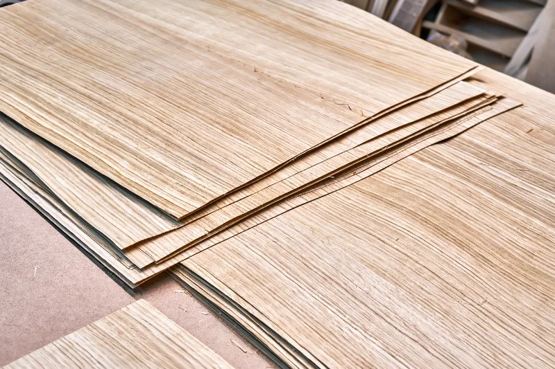 Stacked sheets of fine wood veneer