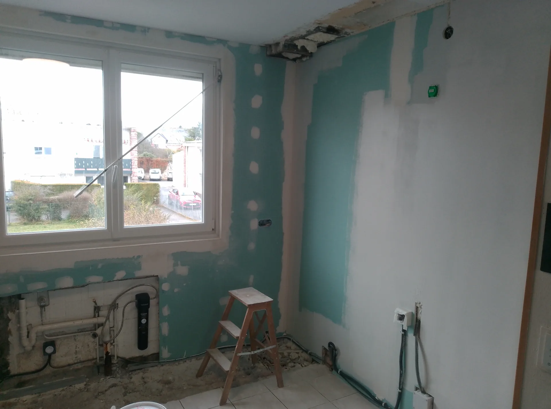 The new wall linings fitted and the white uPVC window replaced