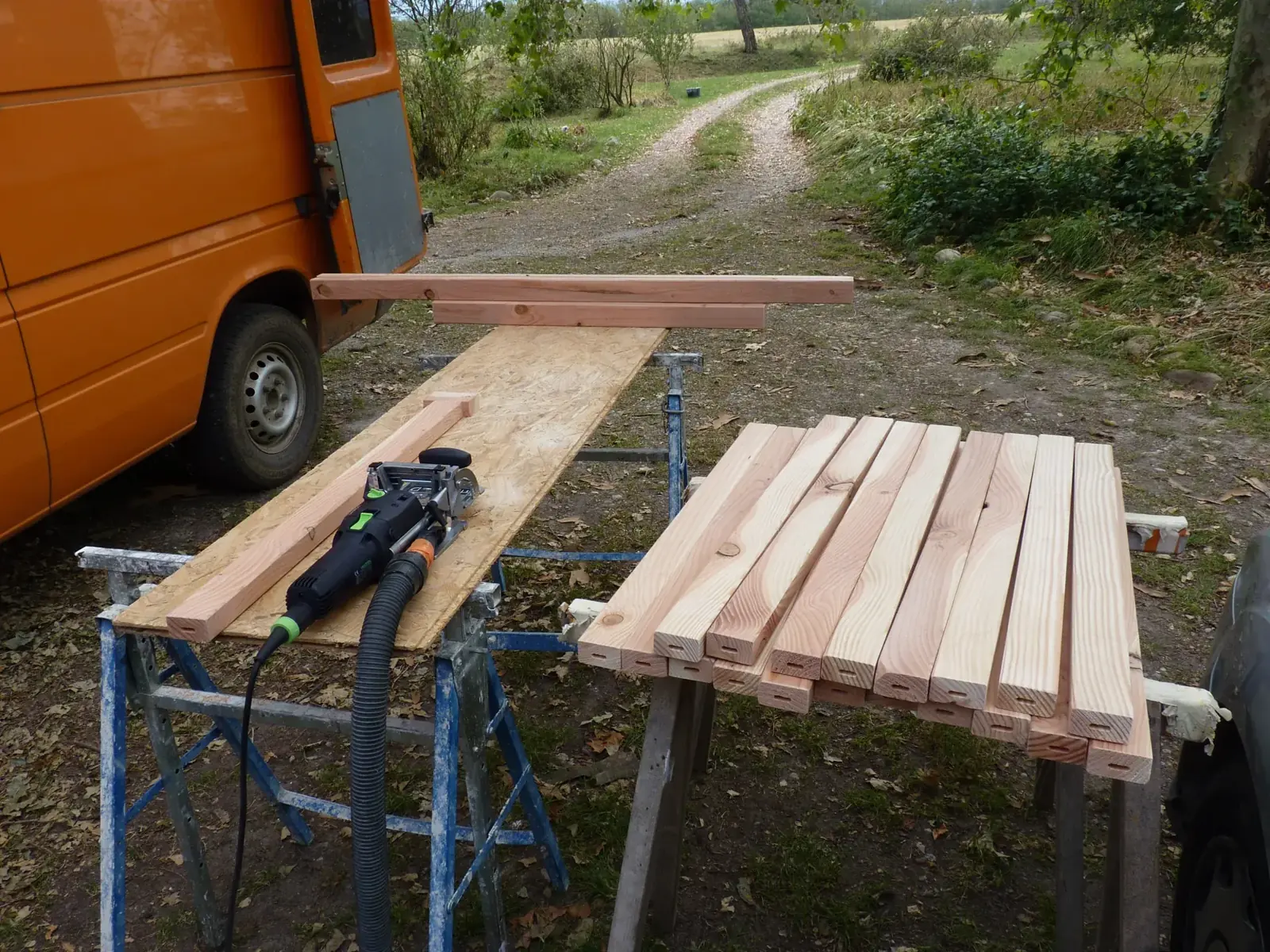 Building the railing on site: Douglas fir balusters cut to length on trestles