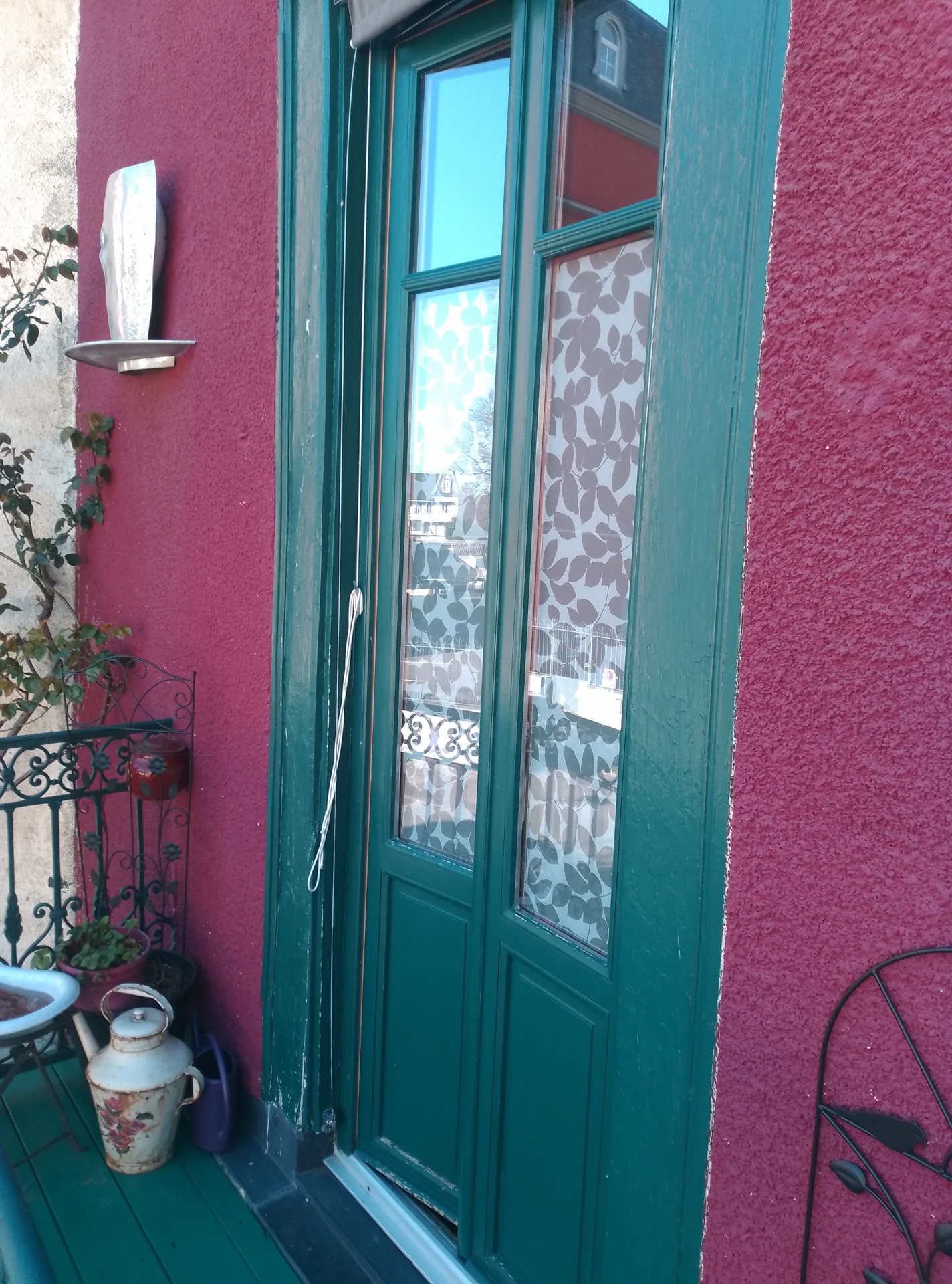 Before the works: the old French doors, seen from the balcony