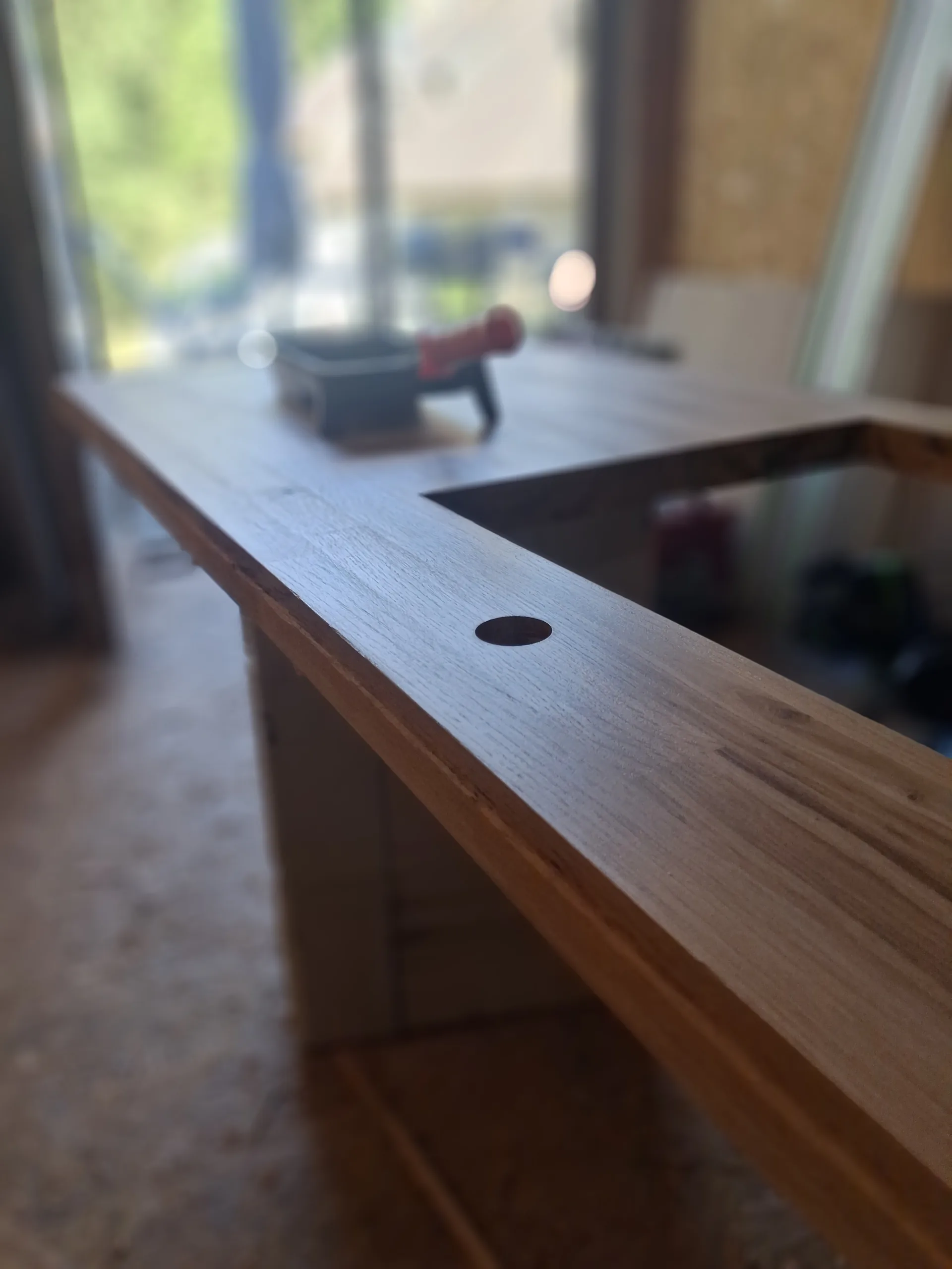 The new glued laminated oak worktop, tap hole cut