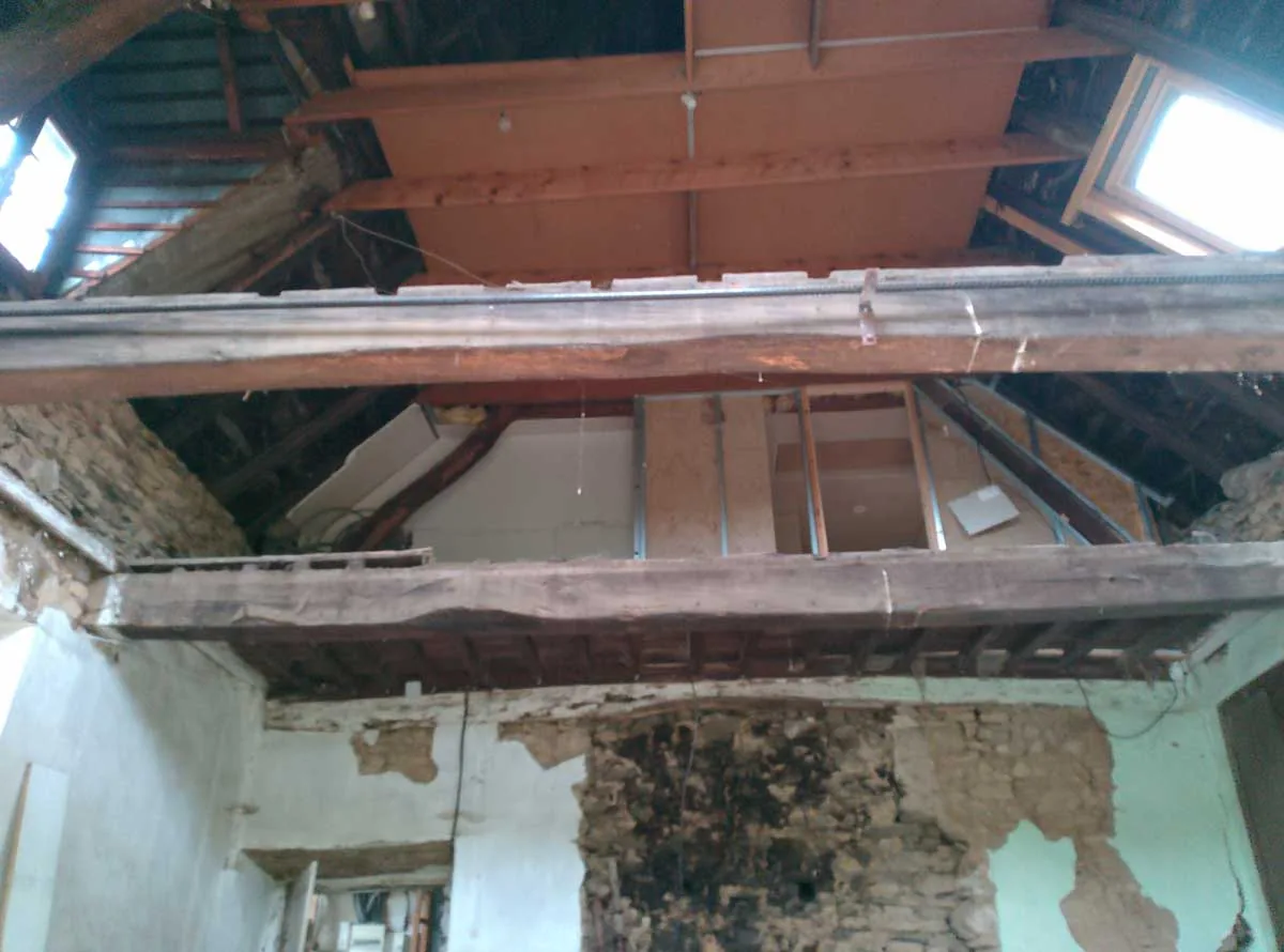 New Douglas fir joists being fitted