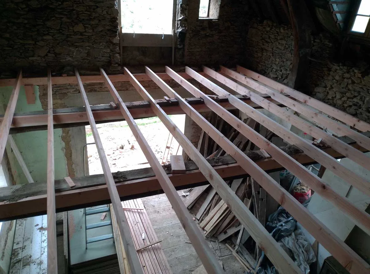 The new joists seen from the level below